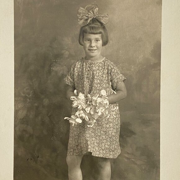 RPPC 1920s Young Swiss Girl Holding Flowers Bouquet Real Photo Postcard - Picture 1 of 5